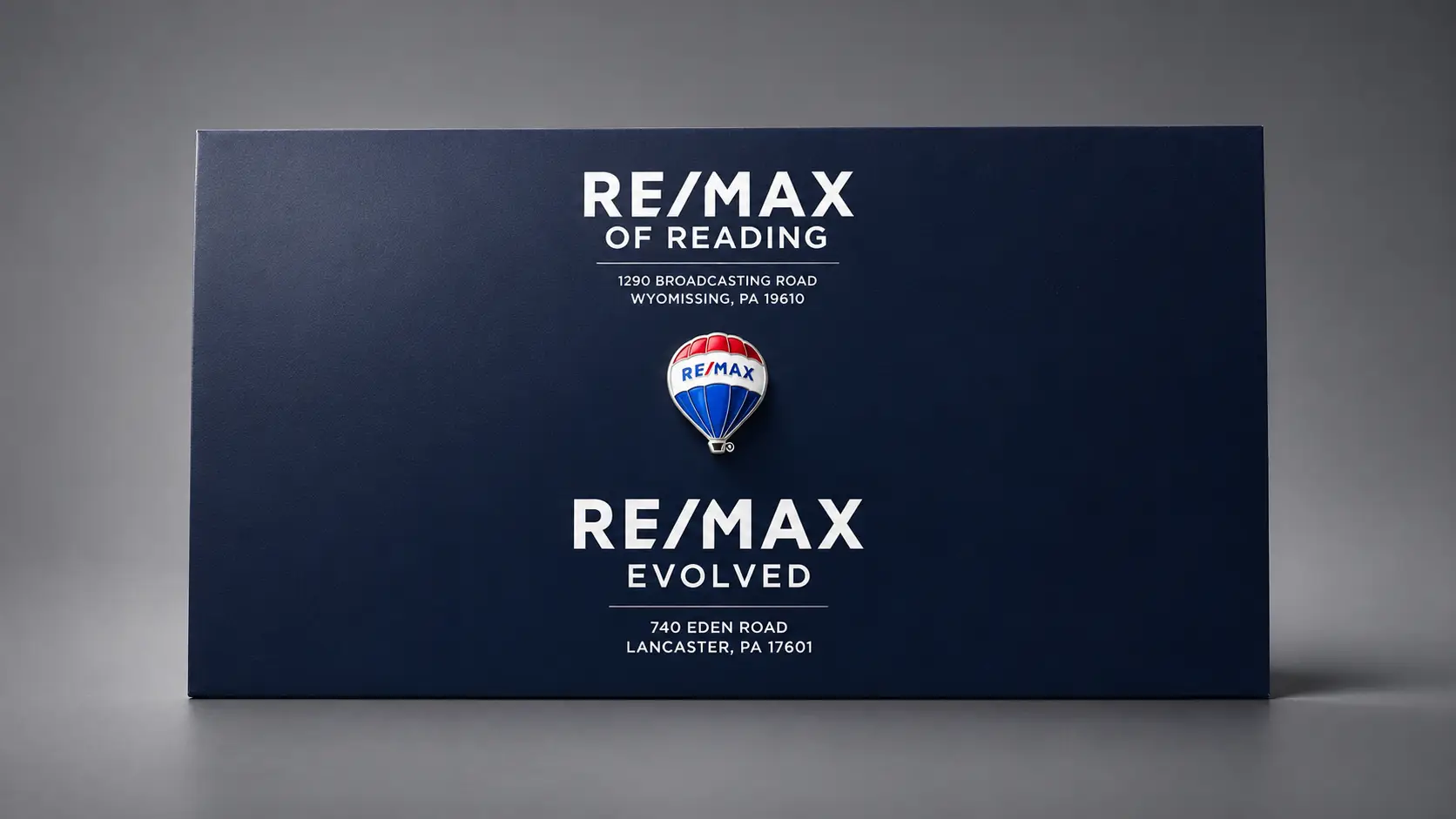 Close-up of premium video brochure cover finishes: soft-touch lamination, foil stamping, and spot UV