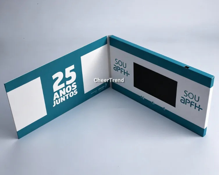 Internal components of a video brochure showing battery, PCB, and speaker layout