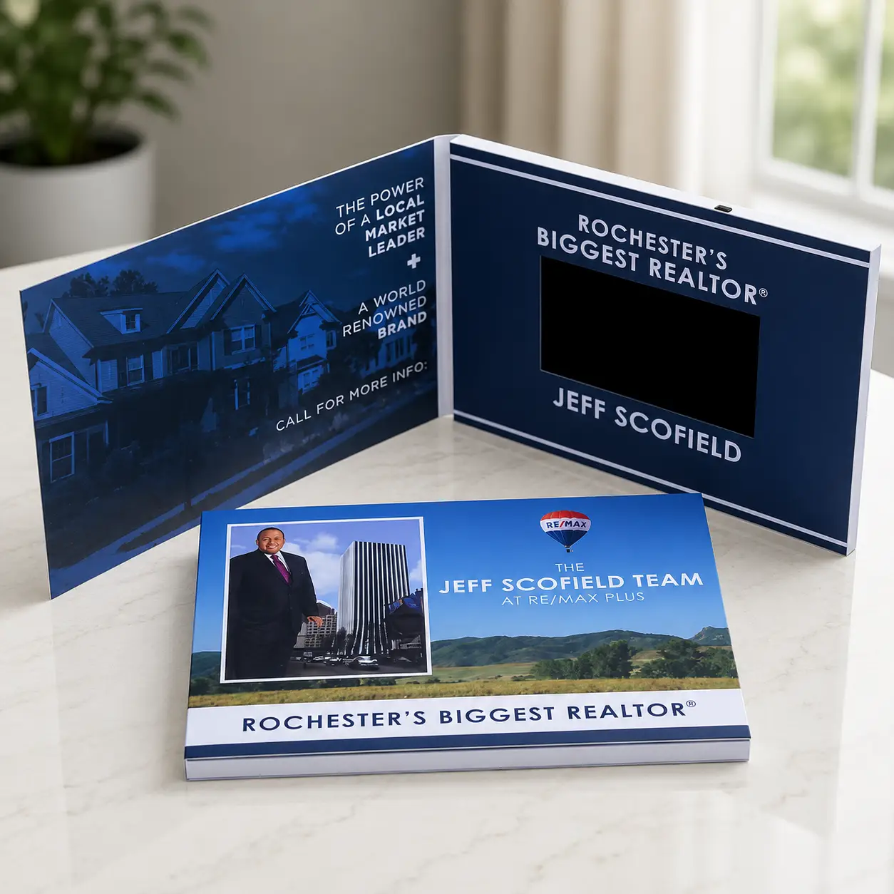 Video brochure screen showing a real estate marketing presentation
