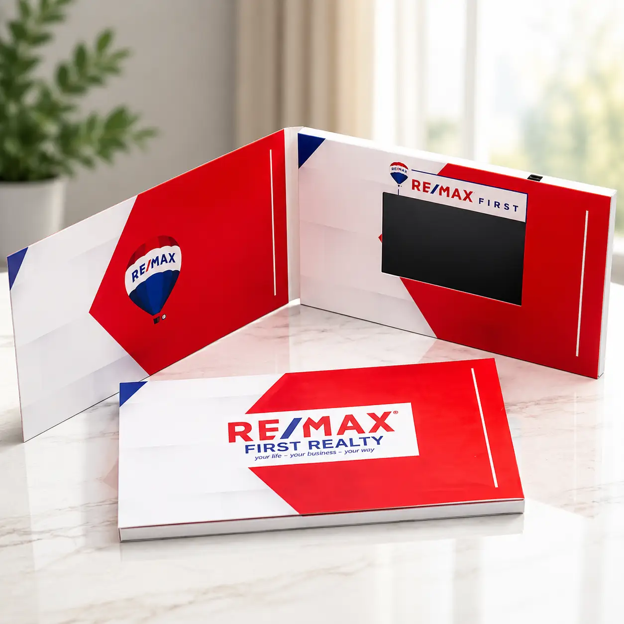 Real estate agent using a video brochure during a listing presentation