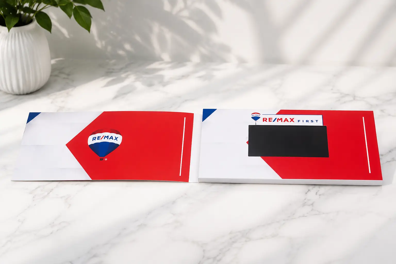 Small batch real estate video mailer cards ready for shipment
