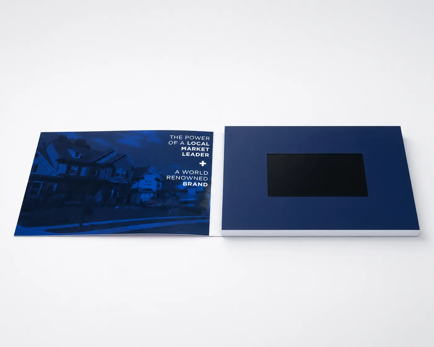Buyer reviewing a single video brochure sample before placing a quantity order